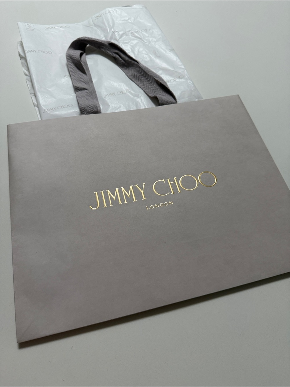 Jimmy Choo strong gift Bag- Taupe with Gold Logo and tissue paper